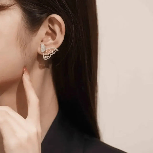 Crystal butterfly climber earrings by Aurex