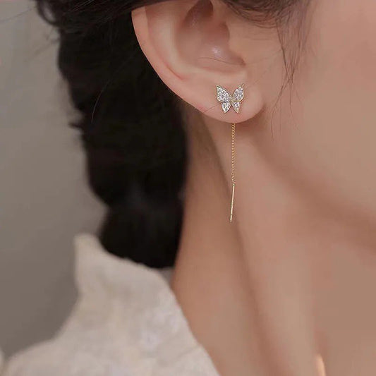 Crystal butterfly threader earrings by Aurex