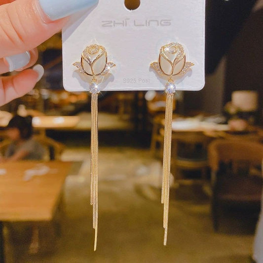 Tulip gold-tone long tassel earrings by Aurex