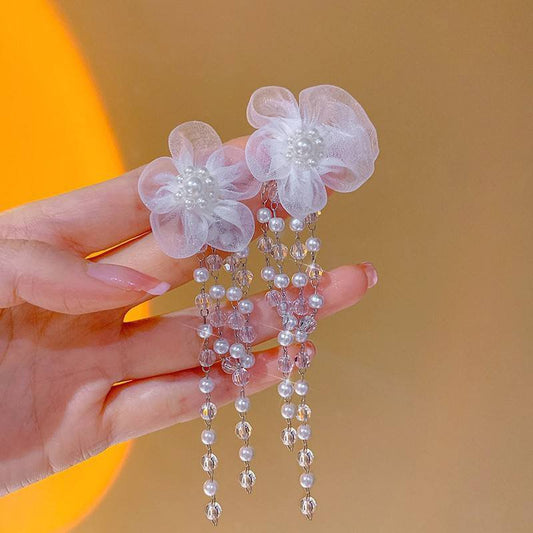 White floral crystal fringe tassel earrings by Aurex