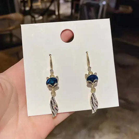 Blue crystal fox hook earrings by Aurex