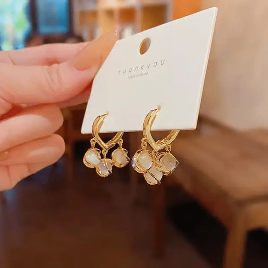 White Clover Charm Huggie Earrings