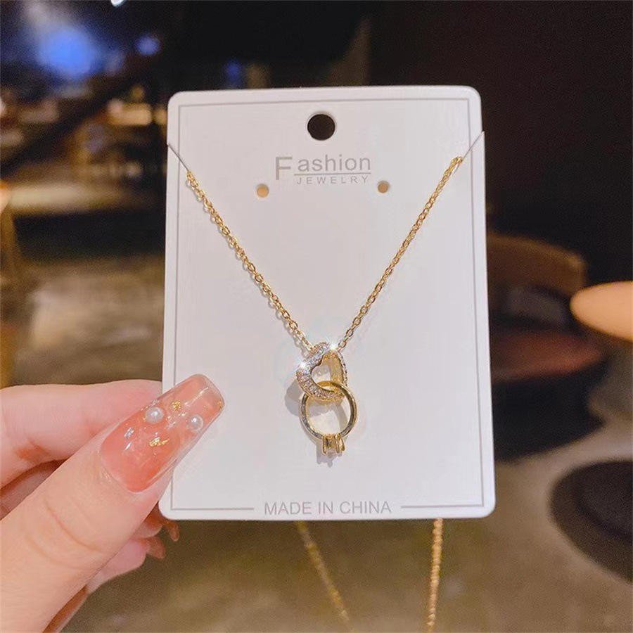 Elegant Interlocked Heart & Ring Pendant Necklace